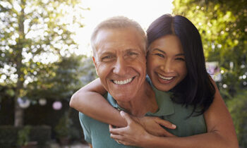 Image Text: 500x332_0000_Portrait Of Loving Mature Couple In Back Yard Garden