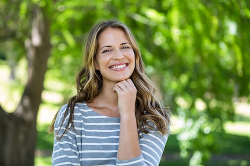 Portrait of a smiling woman Image Text: Portrait of a smiling woman